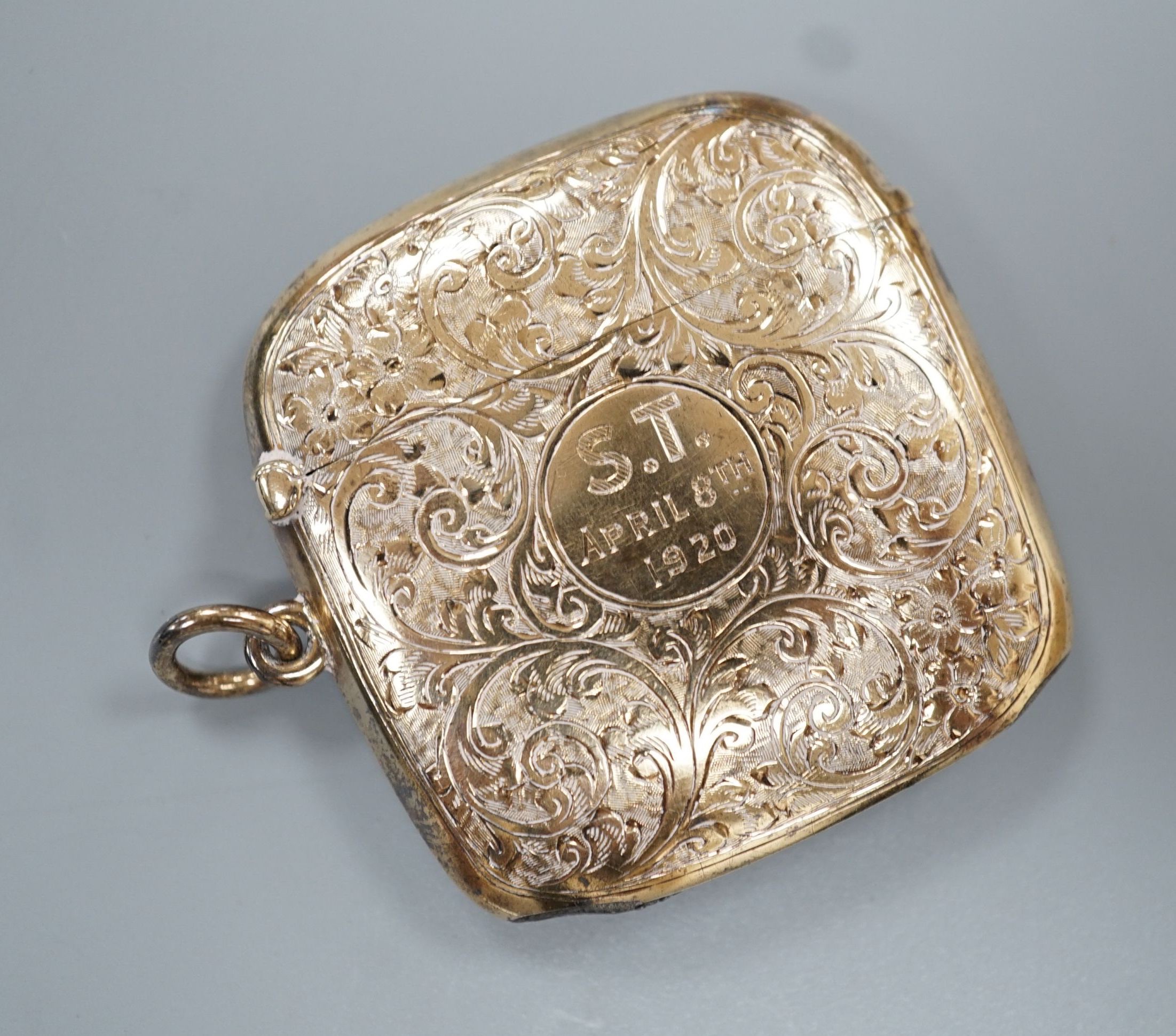 A George V 9ct gold vesta case, with later engraved inscription, Chester, 1913, 45mm, gross 18.4 grams.